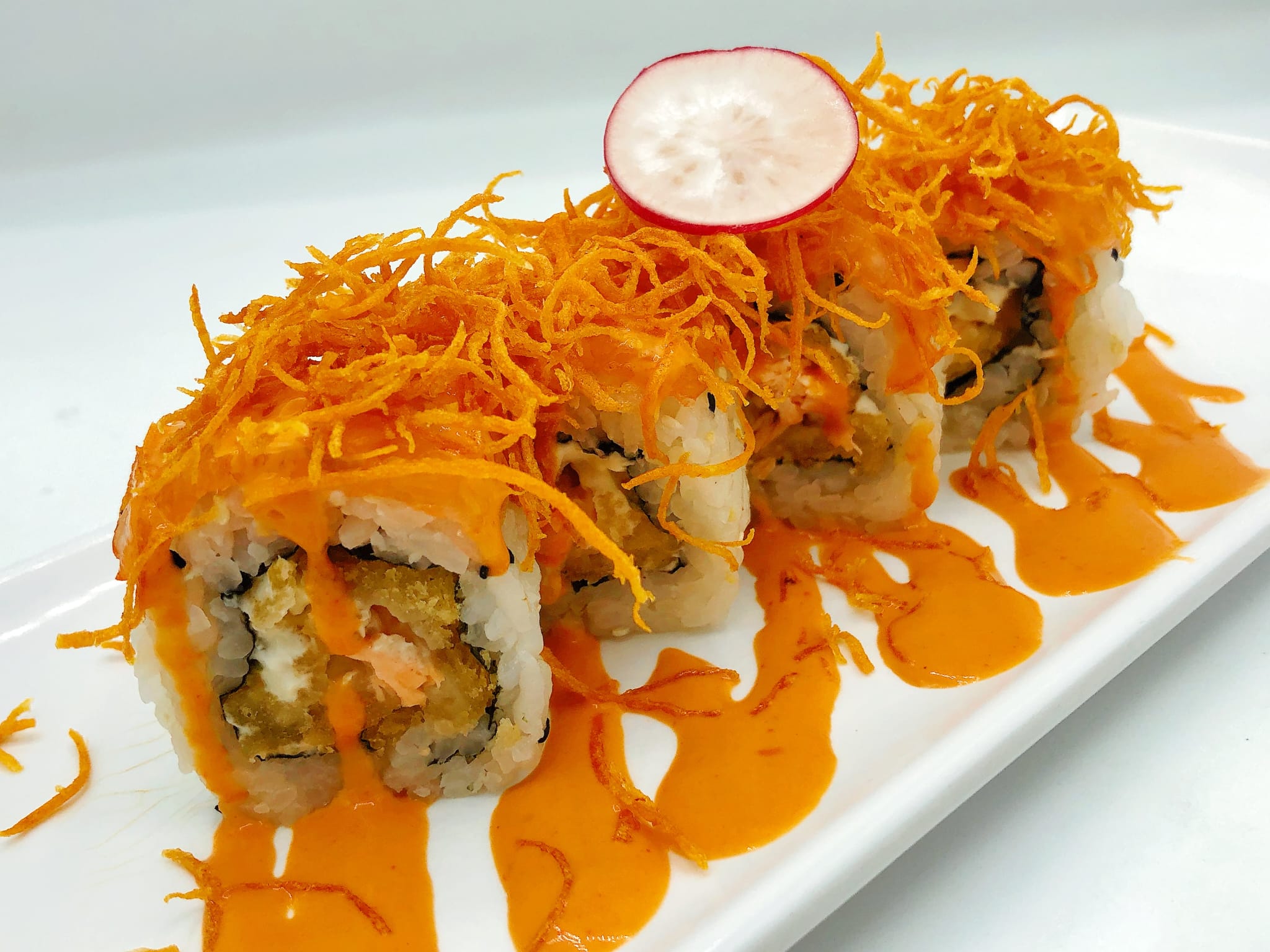 57b / Salmon potato flambé roll